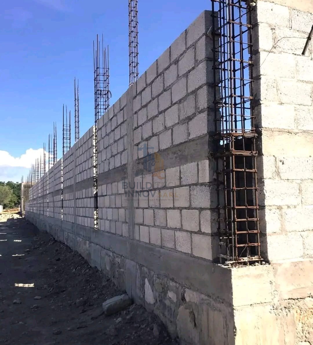 Mur clôture parpaing armé